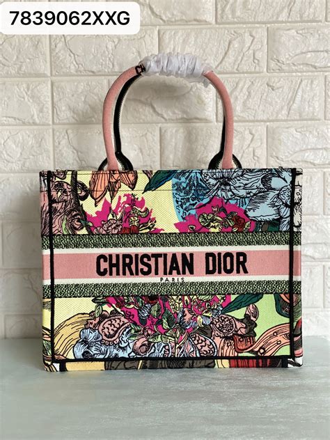 dior floral small wallet.